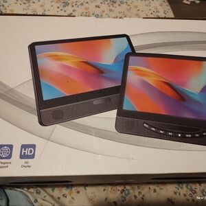 Dual screen DVD with remote for car. Attaches to headrests 5 hr rechargeable bat